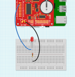 An LED on a breadboard connected to an Expander Pi board on a Raspberry Pi